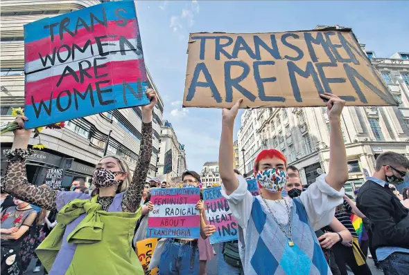  ??  ?? g ‘Thoughtter­minating mantra’: a Trans Pride march in London, last September
Kathleen Stock is the author of Material Girls (Fleet, £16.99)