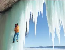  ?? MACGILLIVR­AY FREEMAN FILMS ?? Conrad Anker ascends the frozen waterfalls in Pictured Rocks National Lakeshore in Michigan.