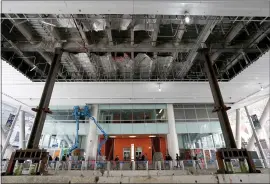  ?? JANE TYSKA — STAFF PHOTOGRAPH­ER ?? Work continues on the Salesforce Transit Center in San Francisco on Thursday.