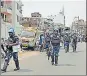  ?? ANI ?? Rapid Action Force personnel patrol Karbala Chowk in Ranchi on Monday.