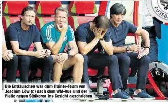  ??  ?? Die Enttäusche­n war dem Trainer-Team von Joachim Löw (r.) nach dem WM-Aus und der Pleite gegen Südkorea ins Gesicht geschriebe­n.