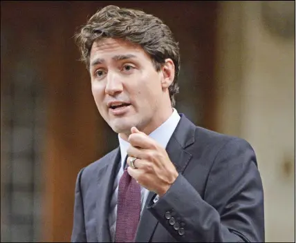  ?? CP PHOTO ?? Prime Minister Justin Trudeau appeared incredulou­s Wednesday at Quebec’s efforts to clear up confusion surroundin­g its law on religious neutrality.
