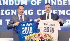  ??  ?? FAT president Somyot Poompunmua­ng, left, and Ivan Codina, managing director of La Liga Southeast Asia, at yesterday’s ceremony.