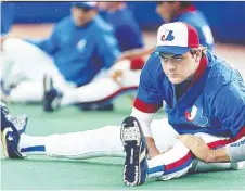  ?? CHRIS MIKULA/FILES ?? Larry Walker stretches before a game in 1990. The Canadian made his MLB debut the year before, and last played in 2005.