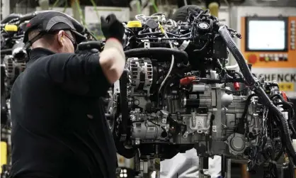  ??  ?? The Society of Motor Manufactur­ers and Traders says research shows tariffs could add £3.2bn a year to costs in the UK. Photograph: Owen Humphreys/PA