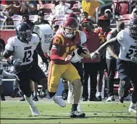  ?? Luis Sinco Los Angeles Times ?? CALEB WILLIAMS (13) showed his running ability with 68 yards against Rice, and USC could lean on his ground game again in Pac-12 opener versus Stanford.