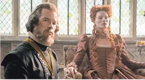  ?? PHOTOS BY LIAM DANIEL/FOCUS FEATURES ?? Guy Pearce stars as William Cecil and Margot Robbie as Queen Elizabeth I in “Mary Queen of Scots.”