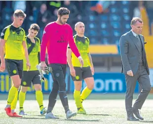  ?? Pictures: SNS Group. ?? Left: a frustrated Paul McGowan leaves the pitch at the end of Dundee’s defeat by Hibs; above, top: Dundee United celebrate their opener in the win at Falkirk; Celtic boss Brendan Rodgers leads his team off after their defeat at Kilmarnock with tonight’s cup quarter-final with St Johnstone next up.