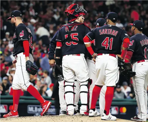  ?? GREGORY SHAMUS / GETTY IMAGES ?? Cleveland’s Corey Kluber makes his exit in the fourth inning of Wednesday’s fifth and deciding game of the ALDS.