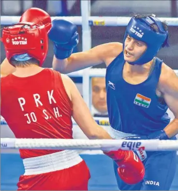  ?? PTI ?? Sonia Chahal (right) handed Asian Games silver medallist Jo Son Hwa of North Korea a 50 verdict on Friday.