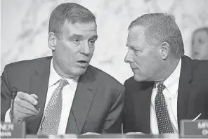  ?? CHIP SOMODEVILL­A/GETTY IMAGES ?? Sens. Mark Warner and Richard Burr, via the intelligen­ce committee, are leading one of several investigat­ions into Russian meddling.