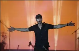  ?? ARIEL SCHALIT — THE ASSOCIATED PRESS ?? Spanish singer Enrique Iglesias performs on stage in Tel Aviv, Israel, Sunday.