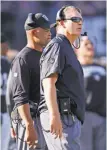  ?? D. Ross Cameron / Associated Press ?? Head coach Jack Del Rio, right, and fired defensive coordinato­r Ken Norton Jr.