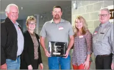  ?? Donnis Hueftle-Bullock ?? Pictured with Wheel Horse Award winner Mike Evans are, from left, John Sennett, CEDC president Joyce Richardson, Evans, Amber Evans and CEDC Executive Director Keith Ellis.