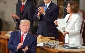  ?? — AFP ?? Speaker of the US House of Representa­tives Nancy Pelosi rips a copy of US President Donald Trump’s speech after he delivered the State of the Union address at the US Capitol in Washington, DC, on Wednesday.