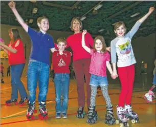  ?? Pictures: Martin Apps FM4271829 Buy these photos at kentonline.co.uk ?? Families enjoy the Kent Roller disco at Maidstone Leisure Centre