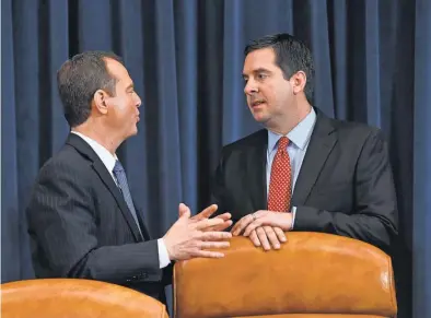  ?? JACK GRUBER/ USA TODAY ?? Adam Schiff, left, senior Democrat on the House Intelligen­ce Committee, with Chairman Devin Nunes, says Republican­s are “adhering to a political deadline rather than ... demands of a proper investigat­ion.”