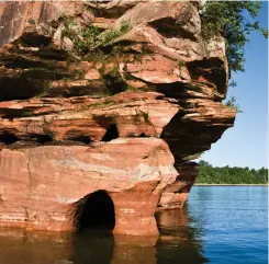  ??  ?? The distinctiv­e red sea caves make a charter trip to Lake Superior and the Apostle Islands all the more memorable.