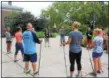  ?? MICHILEA PATTERSON — DIGITAL FIRST MEDIA ?? A group of educators participat­e in a Nordic walking seminar at Pottstown Middle School during the “Healthy Bodies, Healthy Minds Institute.” The educators learned how they could incorporat­e the European activity into the school day.