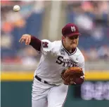  ?? AP Photo/Rebecca S. Gratz ?? Mississipp­i State starting pitcher Will Bednar (24) throws plays Texas in the first inning during a baseball game in the College World Series Saturday at TD Ameritrade Park in Omaha, Neb.