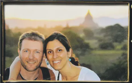  ?? AP ?? Nazanin Zaghari-Ratcliffe with her husband, Richard Ratcliffe, who says ‘we have passed the threshold where Nazanin’s treatment is torture.’ The charity Redress says her treatment ‘is based on discrimina­tion against her for being a British citizen’