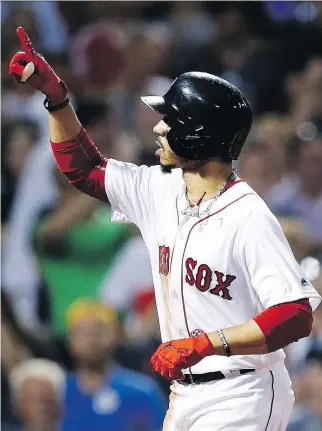  ?? MICHAEL DWYER/THE ASSOCIATED PRESS ?? Boston Red Sox star Mookie Betts is just the latest in a long line of top-flight athletes, stretching from Ted Williams to Tom Brady, who have made their careers in Boston.