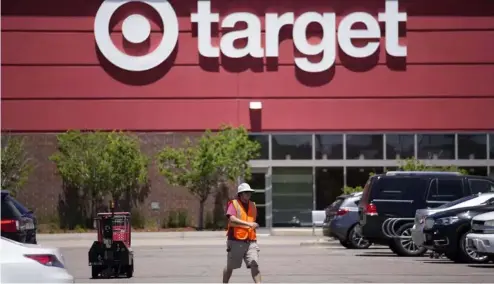  ?? ?? An employee walks outside a Target store in Colorado, United States.