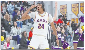  ?? Erik Verduzco Las Vegas Review-journal ?? Taj Degourvill­e scored a combined 39 points in wins over Bishop Gorman and Liberty to help Durango secure the Class 5A Southern League title.