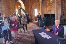  ?? SUSAN WALSH/ASSOCIATED PRESS ?? President Trump speaks to reporters following his teleconfer­ence with troops from his Mar-a-Lago estate in Palm Beach, Fla., on Thursday.