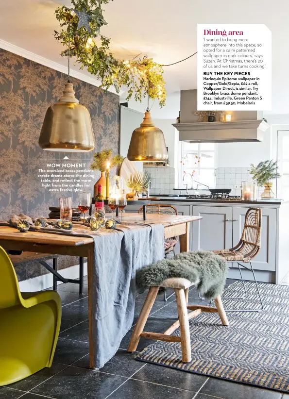  ?? ?? WOW MOMENT
The oversized brass pendants create drama above the dining table, and reflect the warm light from the candles for extra festive glow.