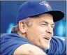  ?? CP PHOTO ?? Toronto Blue Jays manager John Gibbons watches from the dugout before a game against the Kansas City Royals on in Kansas City, Mo.