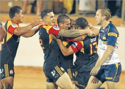  ?? Photo: MARK TAYLOR/FAIRFAX NZ ?? Delighted: Happy Chiefs celebrate after Jackson Willison scored the match-winning try to defeat the Brumbies.