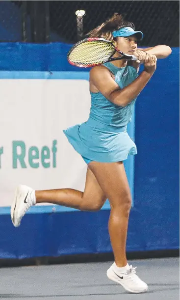  ?? Picture: JUSTIN BRIERTY ?? OUTSTANDNG EVENT: Destanee Aiava returns a shot by Astra Sharma in the women’s final at the Cairns Tennis Internatio­nal.
