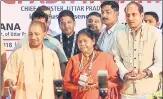  ?? SUBHANKAR CHAKRABORT­Y/HT ?? ▪ CM Yogi Adityanath with union minister of state for food processing Sadhvi Niranjan Jyoti in Lucknow.