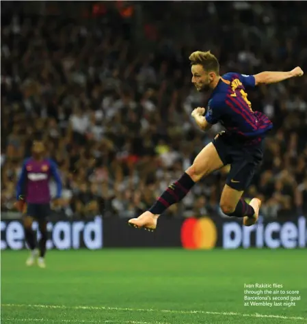  ??  ?? Ivan Rakitic flies through the air to score Barcelona’s second goal at Wembley last night