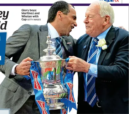  ?? GETTY IMAGES ?? Glory boys: Martinez and Whelan with Cup