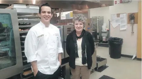  ??  ?? Maple Ridge Secondary’s chef instructor Trevor Randle and teacher Ellen Stover are having a tough time feeding hungry teens with dwindling resources.