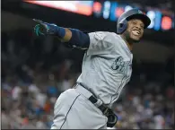  ?? AP PHOTO/LYNNE SLADKY ?? American League's Seattle Mariners Robinson Cano (22), rounds the bases after hitting a home run in the 10th inning, during the MLB AllStar Game, Tuesday in Miami.