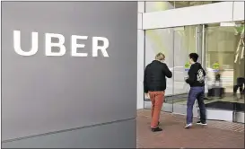  ?? ERIC RISBERG / AP ?? Uber, based in San Francisco, has had an array of recent trouble including sexual harassment allegation­s and a social media campaign against the firm.