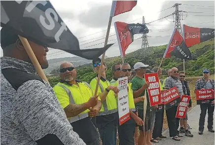  ??  ?? Workers from Grenada, Wellington, strike for equal pay between two subsidiari­es of The Car Distributi­on Group.