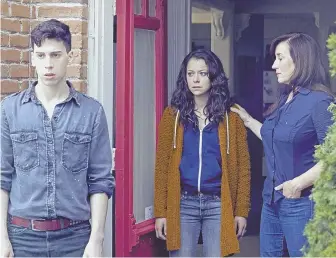  ??  ?? DOUBLE VISION: At left, Tatiana Maslany plays both Rachel and Sarah, among the other roles in `Orphan Black.’ Felix (Jordan Gavaris), Sarah (Maslany) and Mrs. S. (Maria Doyle Kennedy), above from left, plot together in the BBC America series.