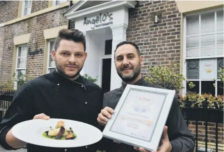  ??  ?? Angelo’s are runners-up in English Italian awards. Owners Nello Russo, left, and Federico Trulli with the award.