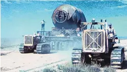  ?? SOURCE: ATOMICHERI­TAGE.ORG ?? Military personnel are seen moving “Jumbo” to the Trinity Site in this historic photo. Trinity Site motor coach tours are slated to begin in fall.