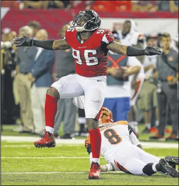  ?? CURTIS COMPTON / CCOMPTON@AJC.COM ?? Falcons defensive end Jonathan Massaquoi, celebratin­g after sacking the Bengals’ Josh Johnson, has shown some pass-rush ability.