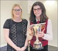  ??  ?? Open solo winner Amy Paterson, right, with adjudicato­r Erin McSporran.