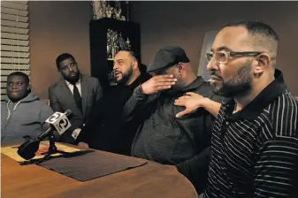  ?? Carlos Avila Gonzalez / The Chronicle ?? Marc McCoy (second from right) becomes emotional while recalling his brother, Willie McCoy.