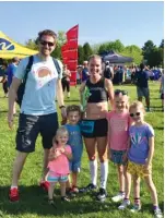  ?? PROVIDED PHOTO ?? Jeannie Sullivan is supported by her family in her return to competitiv­e running. Husband Todd, Phoebe, 2, and Dashiell, 4, are on her right while Natalie, 8, and Rory, 6, are on her left.