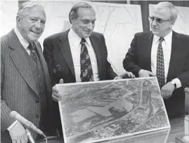  ?? CHICAGO TRIBUNE ?? John Serpico, chairman of the Chicago Regional Port District, is flanked by board member Paul Randolph, left, and General Manager Gilbert Cataldo on Jan. 20, 1984, as they announce a developmen­t plan. Serpico was convicted in 2001 of improperly using his influence over union funds to obtain millions of dollars in personal loans from banks.