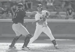  ?? NOAH K. MURRAY/AP ?? Mets DH Pete Alonso reacts after being called out on strikes with the bases loaded in the ninth inning Sunday against the Mariners.