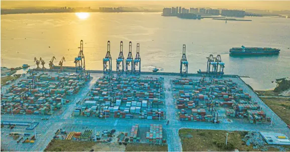  ?? Photo: Xinhua/Pu Xiaoxu ?? Aerial photo taken on Dec. 5, 2021 shows the Yangpu internatio­nal container port at Yangpu economic developmen­t zone in south China’s Hainan Province.